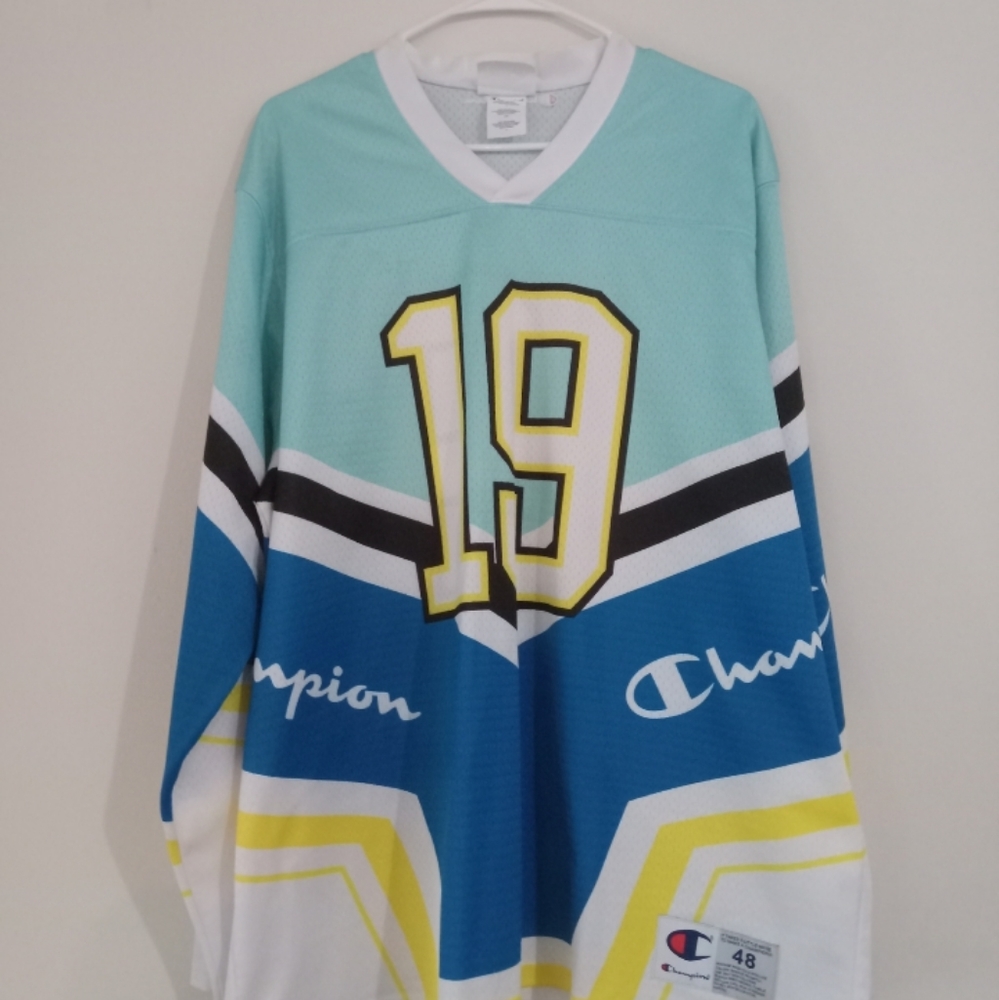 Champion Hockey jersey size 48..two-toned blue & white.